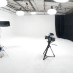 Photo studio hire London showing professional camera, lighting equipment, and product photography setup in a modern studio space