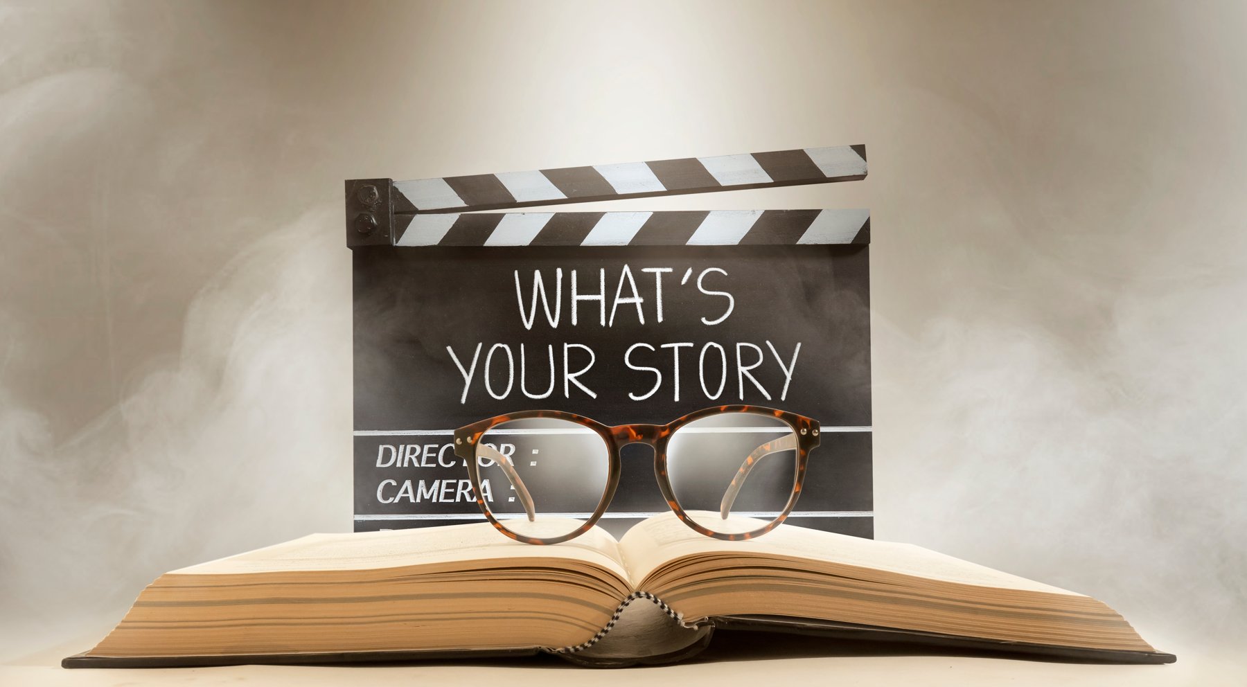 Clapperboard and book illustrating visual storytelling
