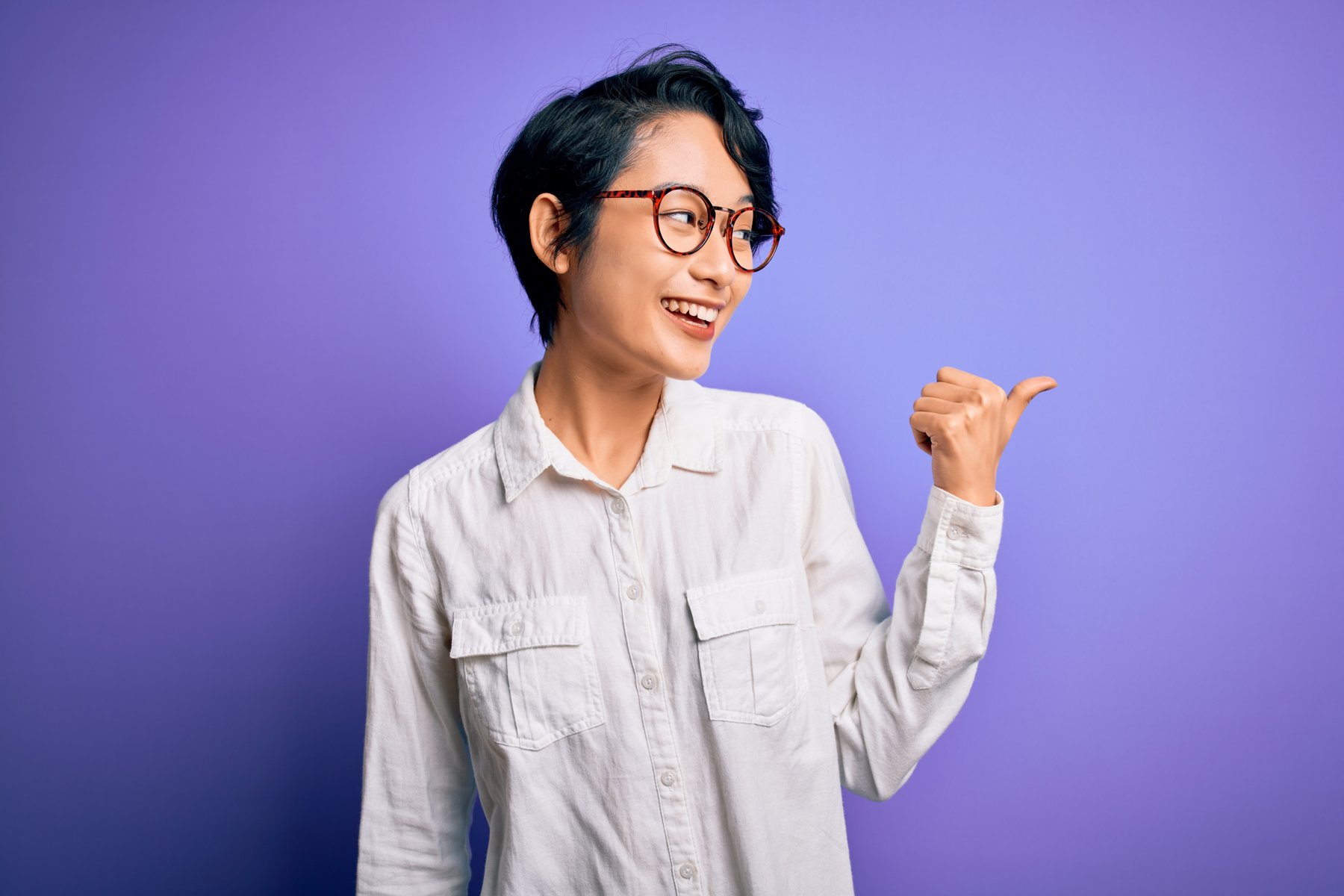 Expressive talent portrait against a purple background