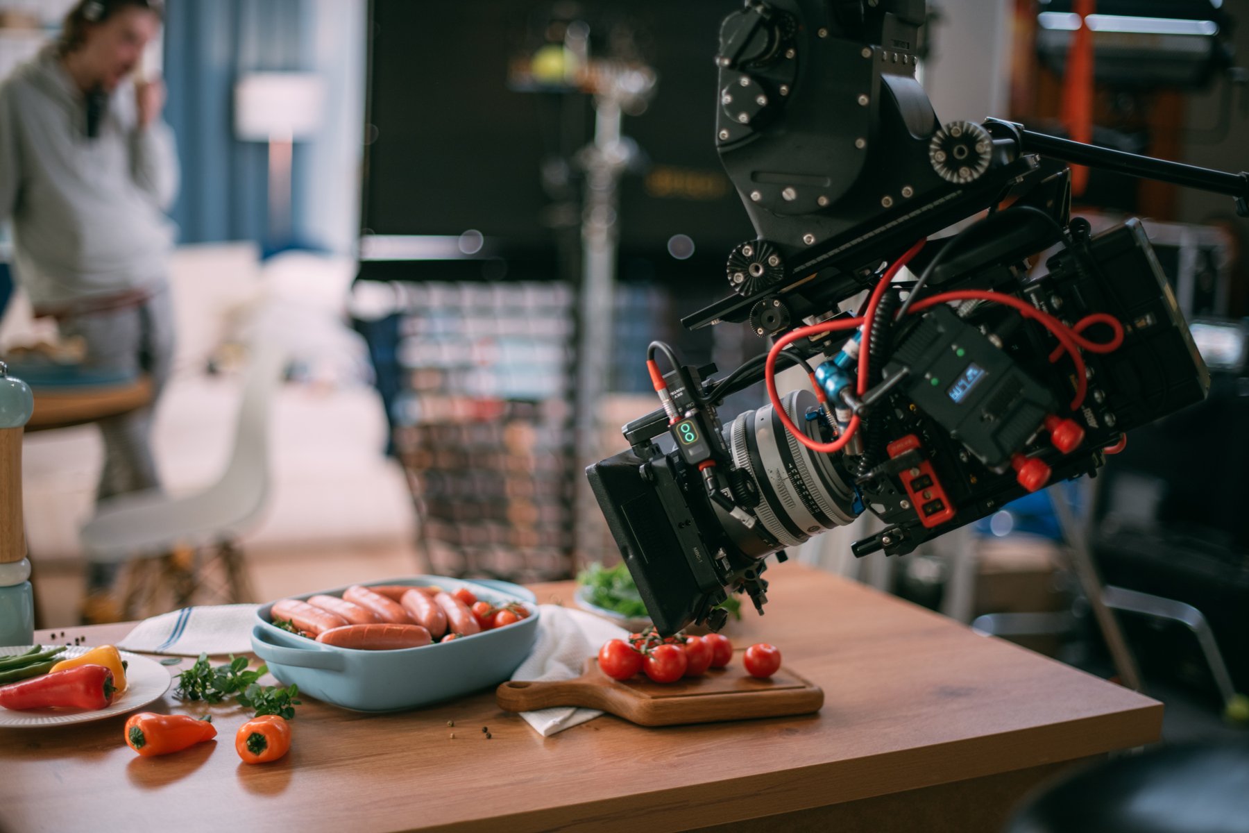 Close-up of a camera filming styled food for a commercial