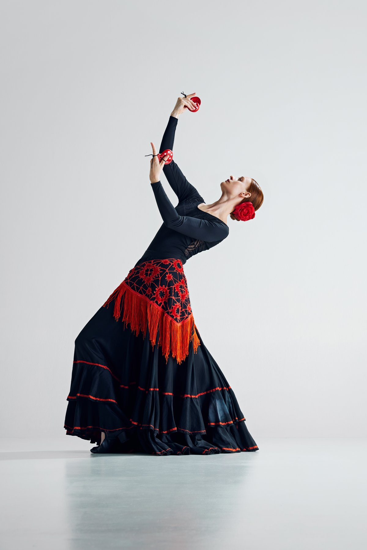 Flamenco dancer in a red and black costume