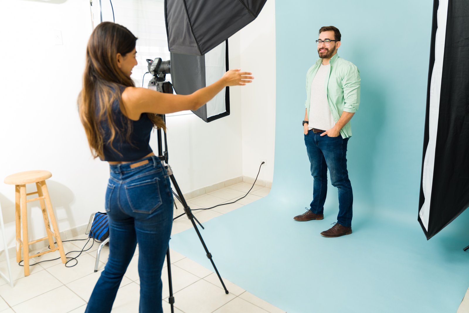 Photographer guiding a model during a portrait shoot