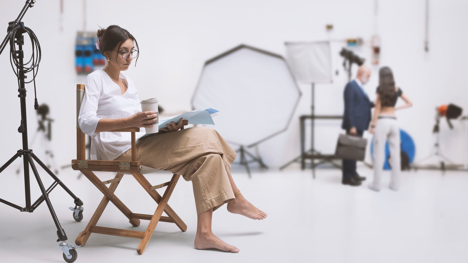 Performer preparing a script ahead of a film studio hire session