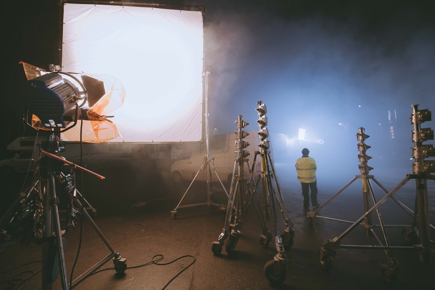 Lighting equipment arranged around a production set
