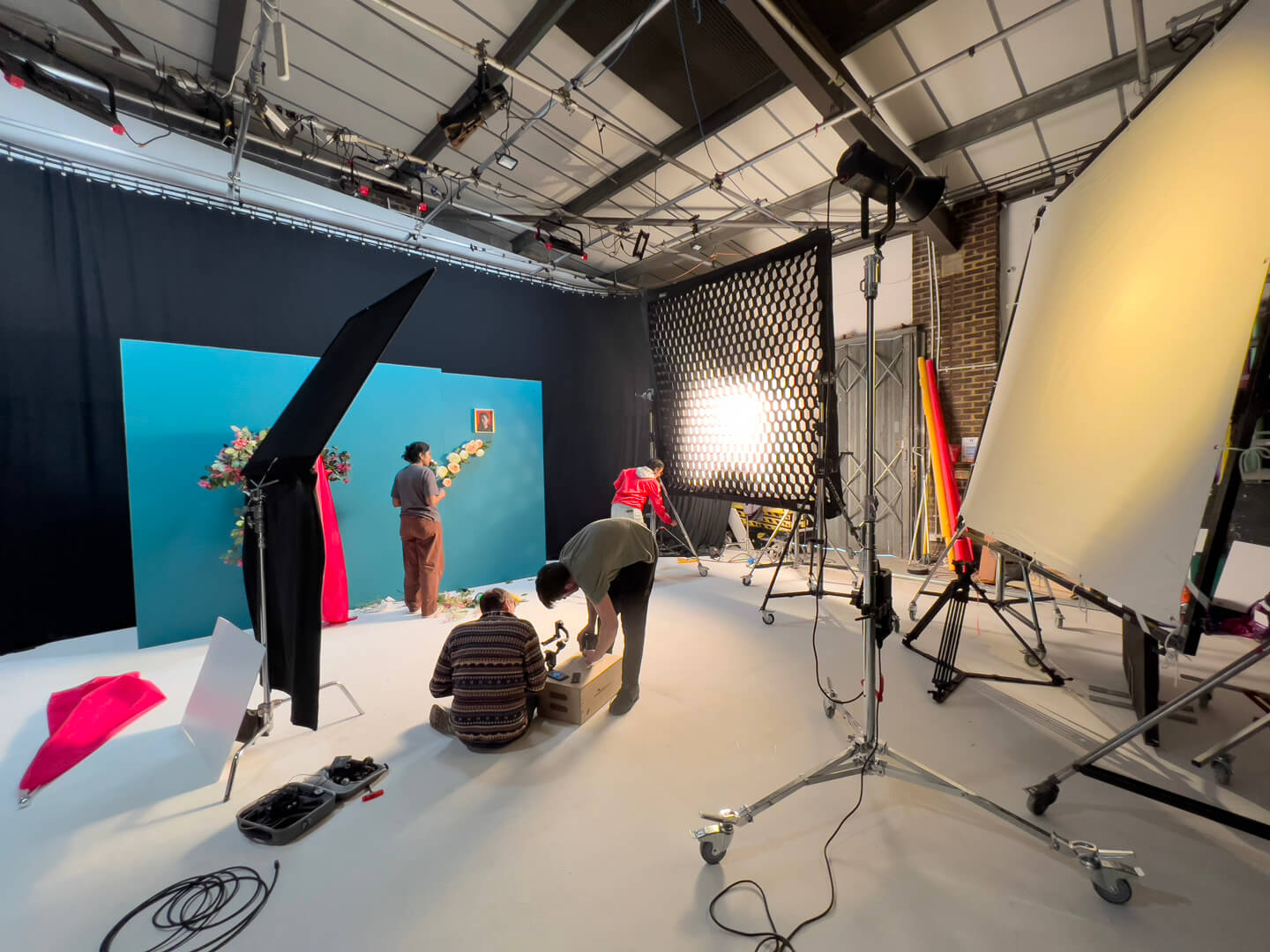 Production crew building a custom narrative set block for a music video shoot