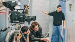 Camera crew preparing a narrative scene with a performer